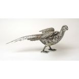 A silver model of a pheasant.