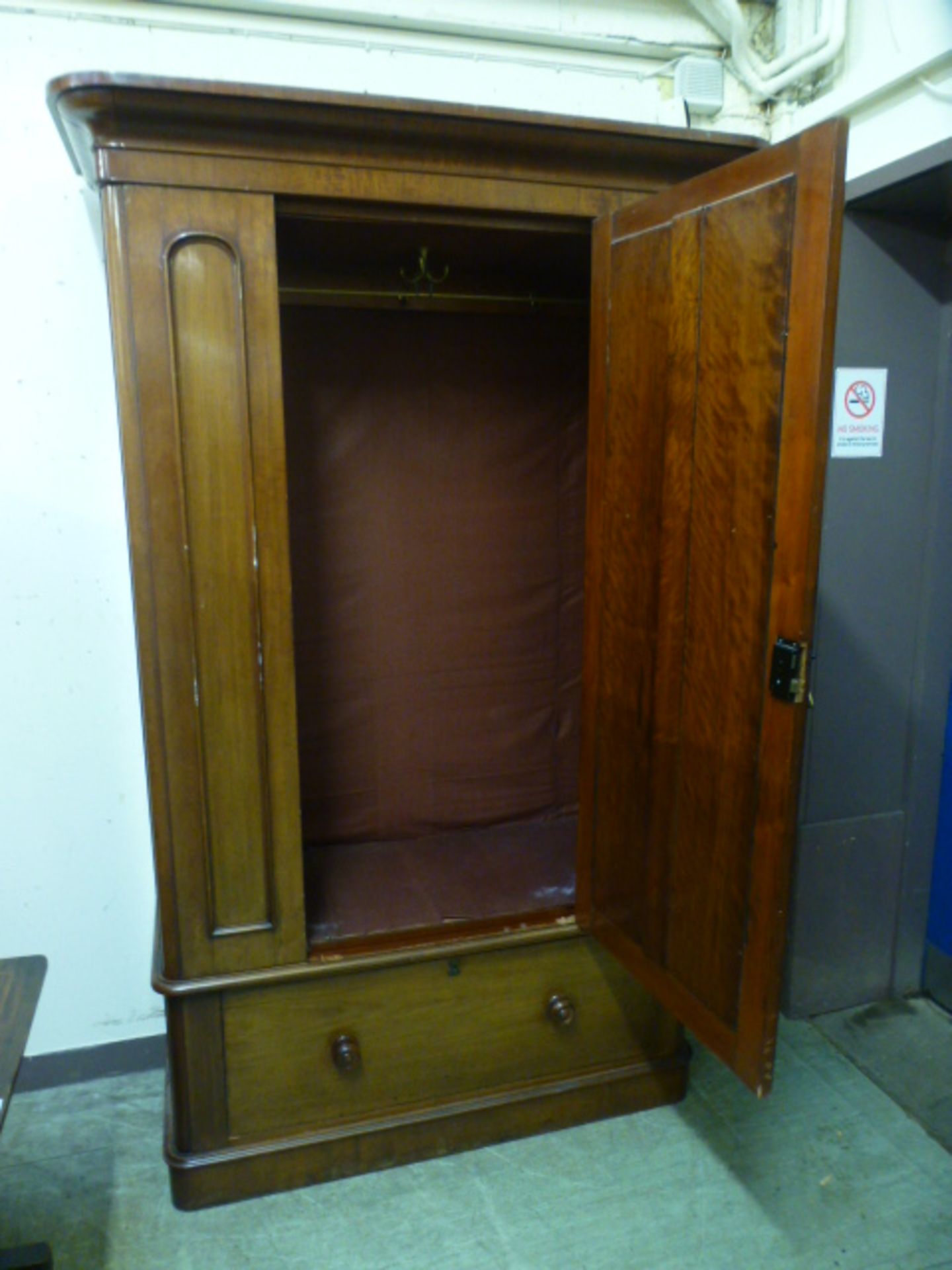 A Victorian mahogany veneered wardrobe having a mirrored bevelled glass centre door with drawer to - Image 2 of 2