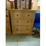 A pine chest of two short over two long drawers