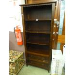 A stained wooden bookcase with two drawers to base