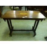 A Victorian mahogany inlaid hall table with bobbin supports