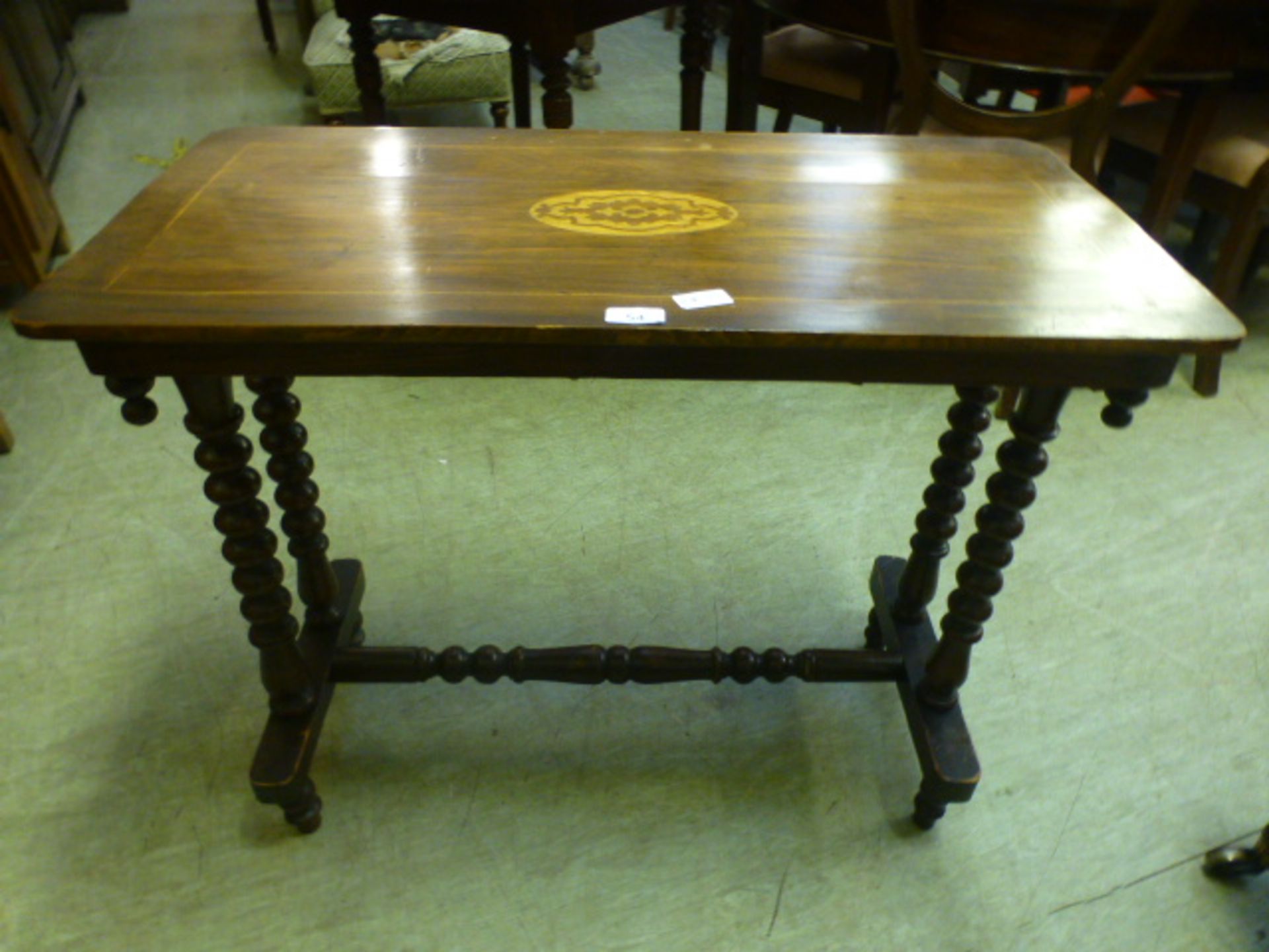 A Victorian mahogany inlaid hall table with bobbin supports