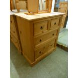 A pine chest of two short over two long drawers