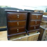 A pair of modern three drawer bedside chests