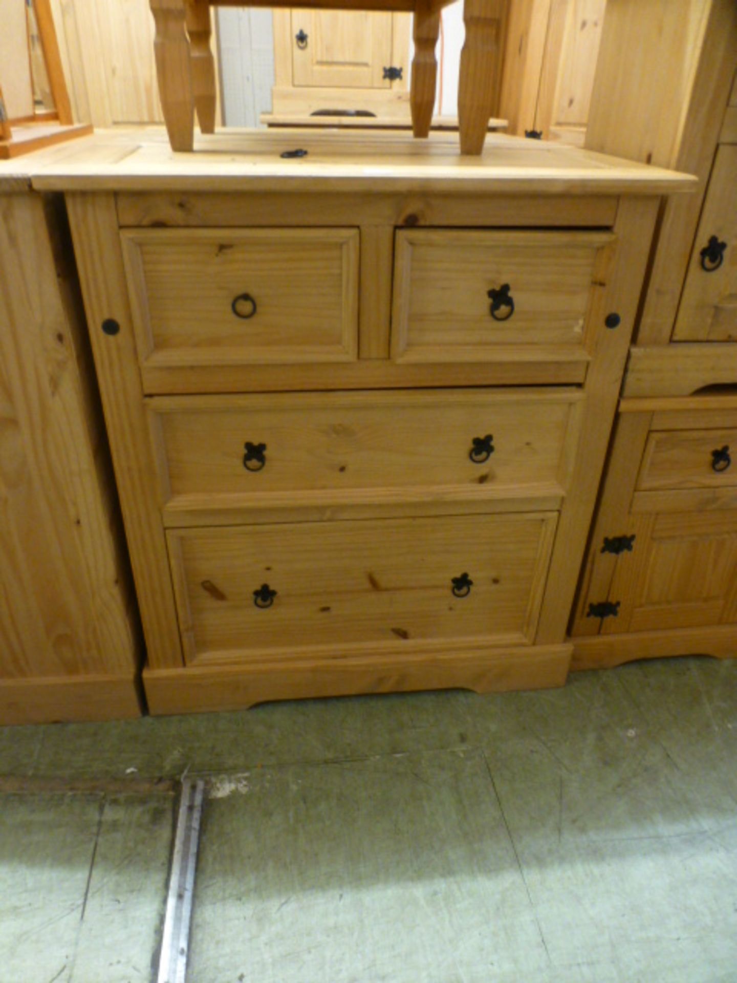 A pine chest of two short over two long drawers