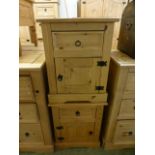 A pair of pine bedside cabinets