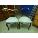 Two late Victorian rosewood balloon back bedroom chairs