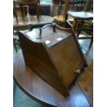 A Victorian mahogany coal box