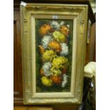 A framed oil on canvas of chrysanthemums,
