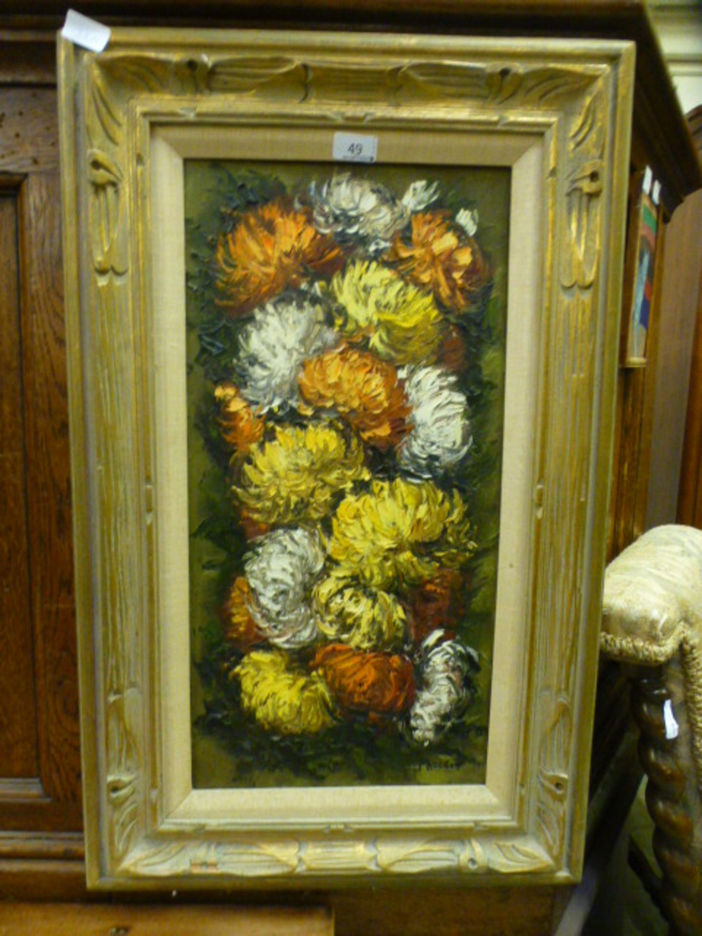 A framed oil on canvas of chrysanthemums,