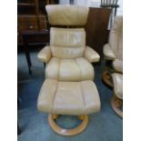 A cream leather relaxing swivel chair with matching stool