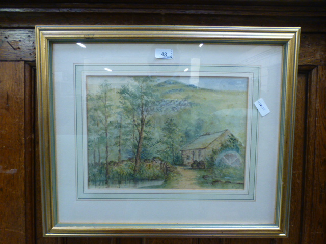 A framed and glazed watercolour of water mill in woodland scene,