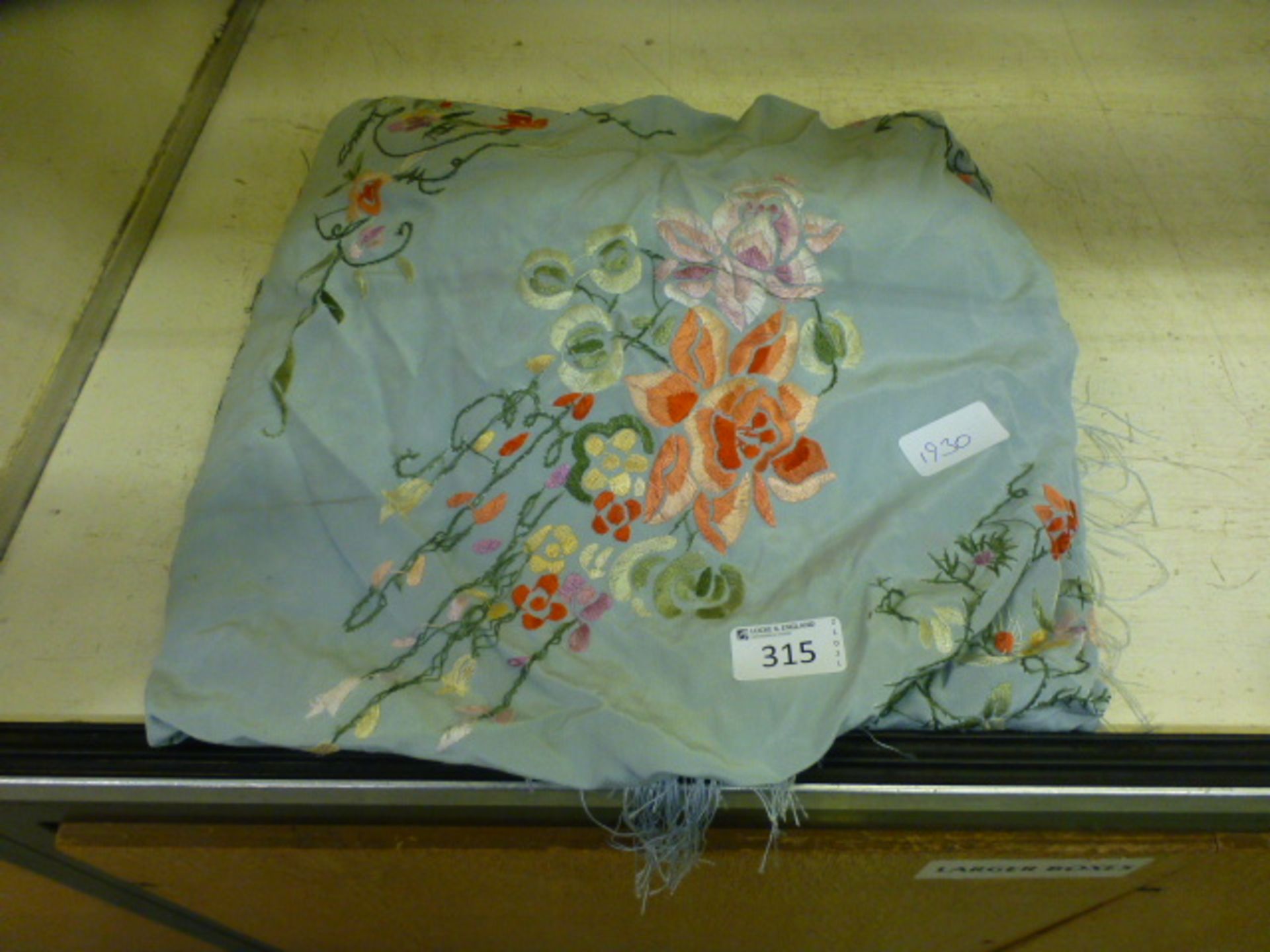 A Chinese embroidered throw