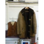 A Wareing leather waist coat along with a sheepskin jacket