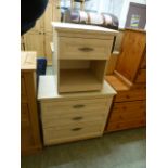 A sycamore effect chest of three long drawers along with a matching bedside cabinet