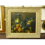 A gilt and wash framed oil on canvas of still life signed bottom right
