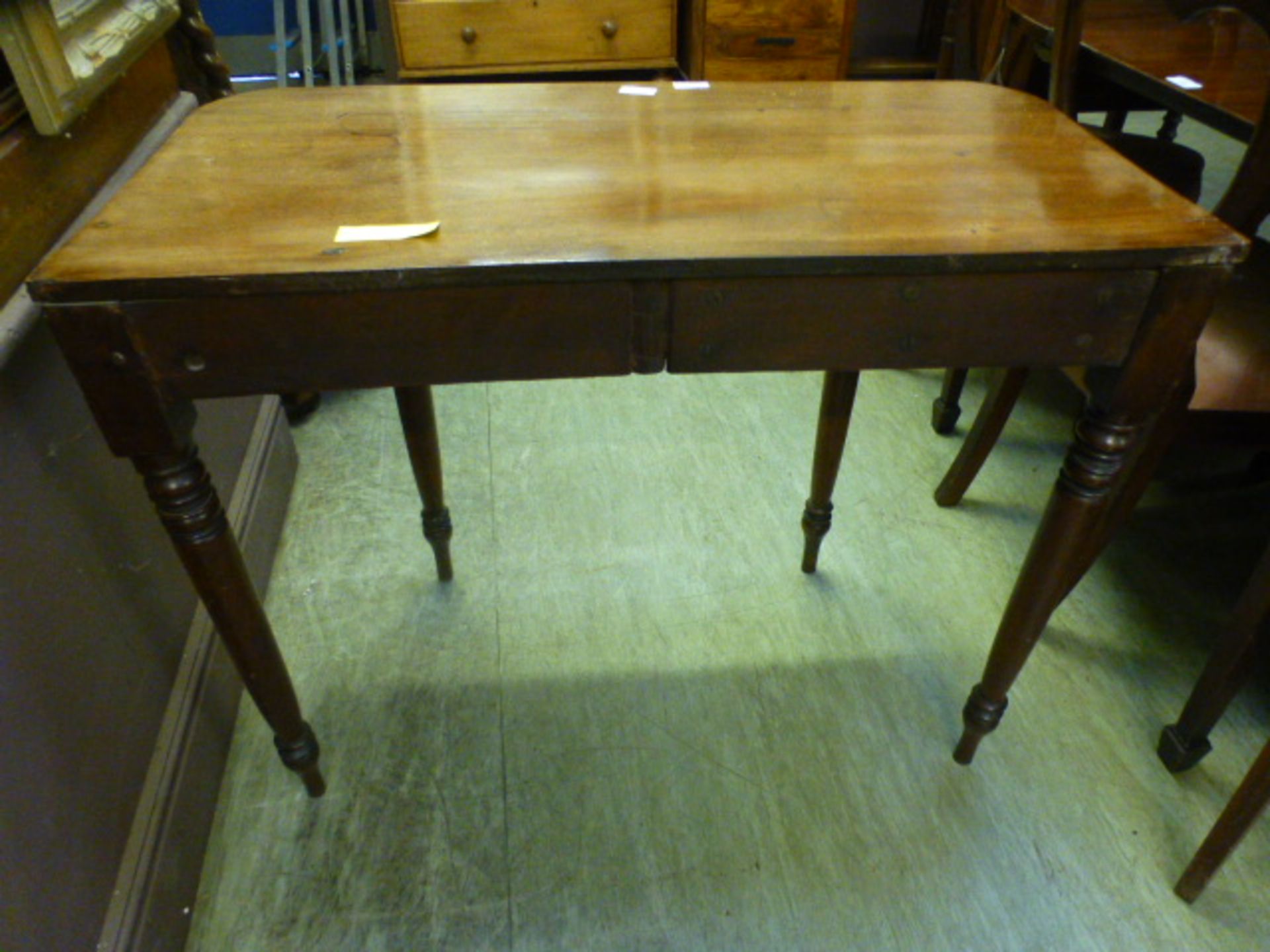 An early 19th century mahogany side table on turned legs, - Image 2 of 2