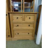 A pine chest of two short over two long drawers