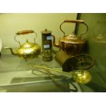 A selection of metalware to include a copper kettle, brass teapot, miners lamp etc.
