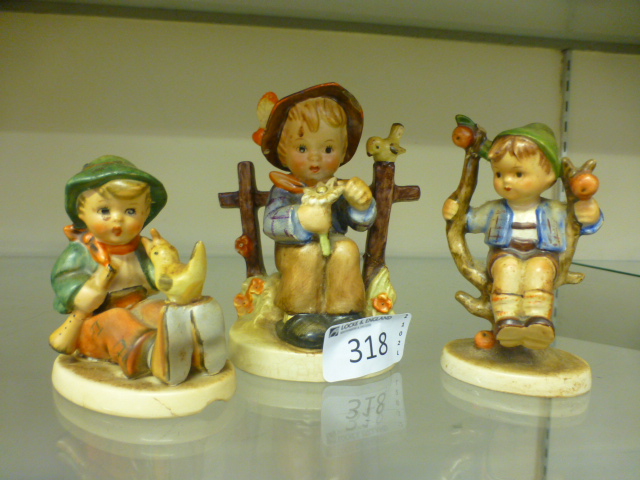 Three Goebel figurines of children