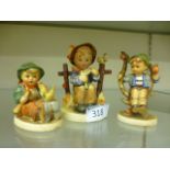 Three Goebel figurines of children