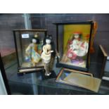 Three oriental style dolls,