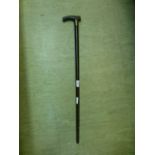 A walking cane with silver collar and horn handle CONDITION REPORT: Shaft believed