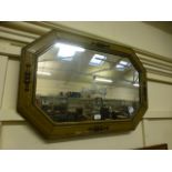 A reproduction wood effect wall mirror