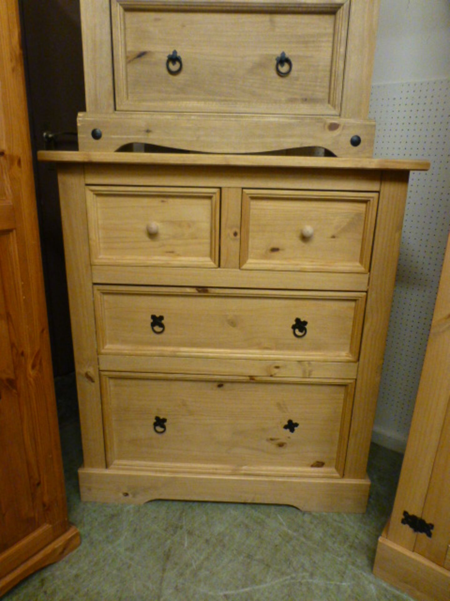 A stripped pine chest of two short over two long drawers