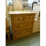 A pine chest of two short over two long drawers