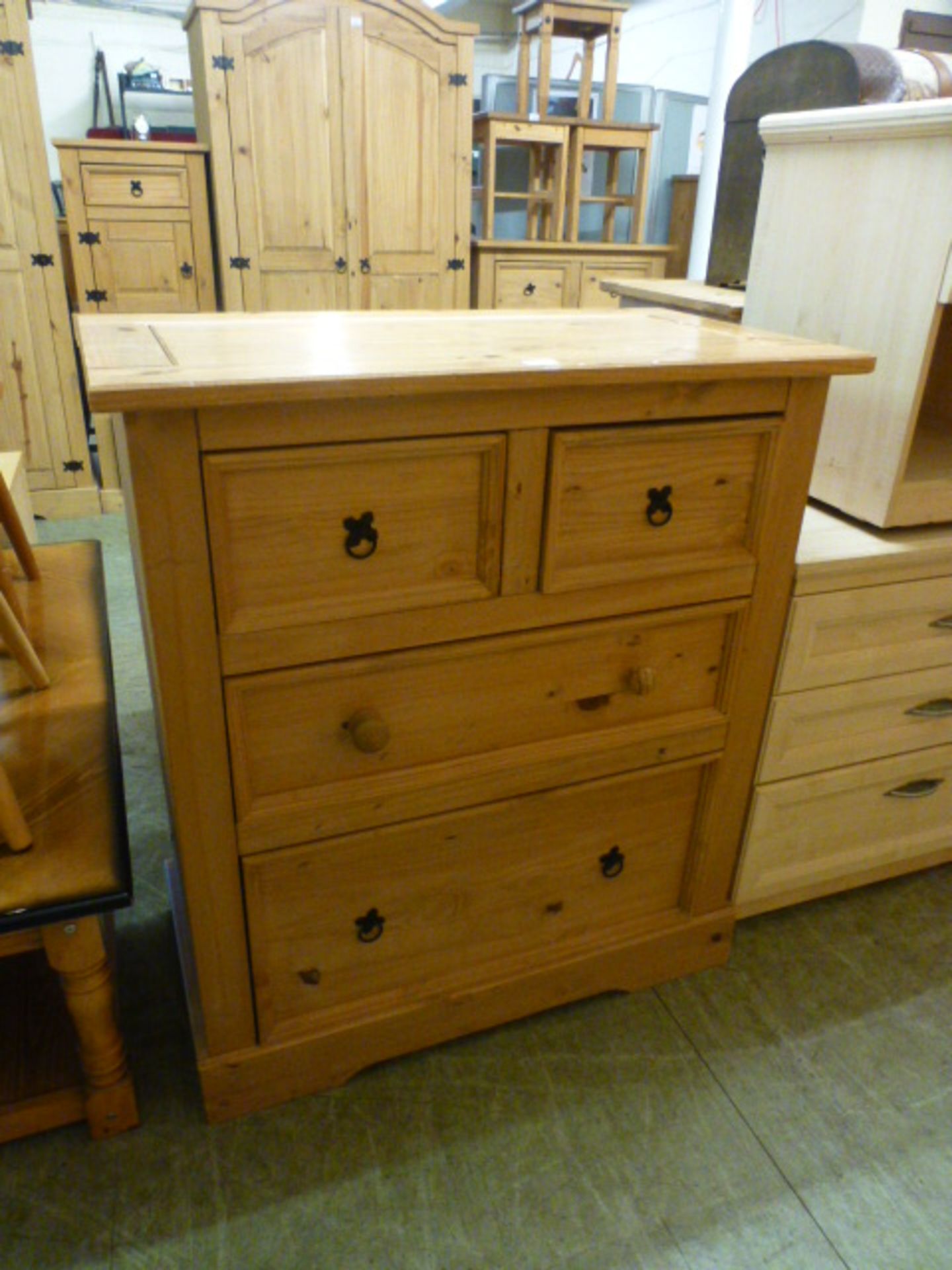 A pine chest of two short over two long drawers