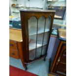 A reproduction mahogany effect corner glazed cabinet