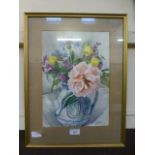 A framed and glazed watercolour of still life signed bottom right H.