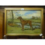 A gilt framed oil on canvas of a dog,