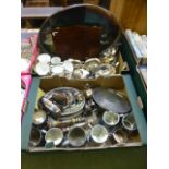 Two trays of mainly plated ware to include teapot, water jug, trays, ceramic cups and saucers,