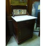 An Edwardian marble topped walnut washstand,