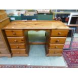 A modern pine twin pedestal dressing table