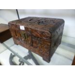 A carved wooden desktop box