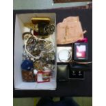A carton of assorted costume jewellery to include bangles, beads etc.