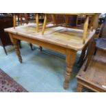 A waxed pine dinning table