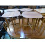 Four mid-20th century design folding occasional tables