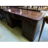 A Victorian and later mahogany twin pedestal desk,