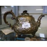 A mid 19th century plated ornate teapot