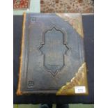 A large old leather bound family bible with brass edging's