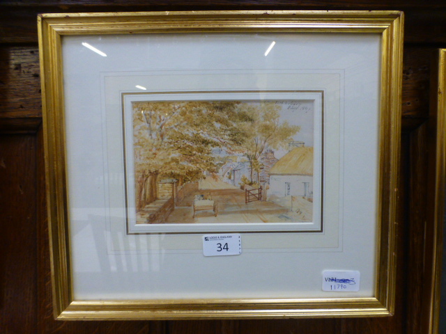 A framed and glazed watercolour of street scene,