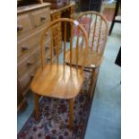 A pair of elm stick back dinning chairs