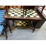 An Edwardian green tiled top walnut occasional table with under tier