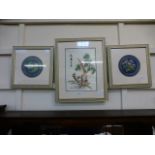 A pair of framed and glazed oriental needlework's along with a needlework on silk