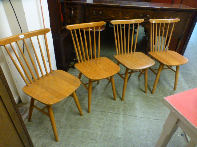 A set of four beech and ply kitchen chairs