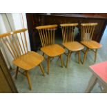 A set of four beech and ply kitchen chairs